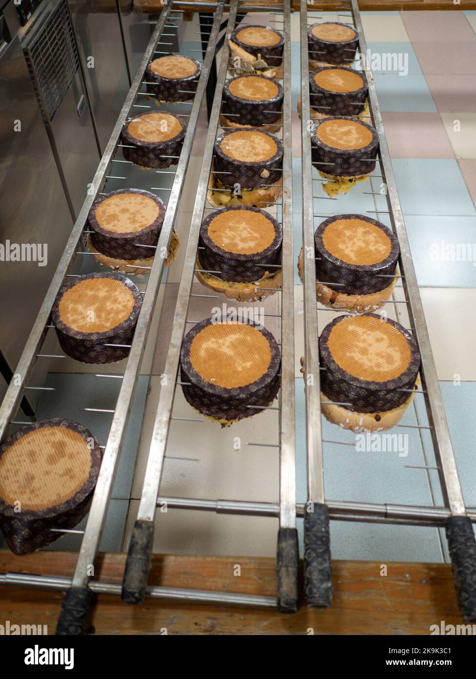 panettone cooking secrets concept hanging up down in the kitchen Stock Photo