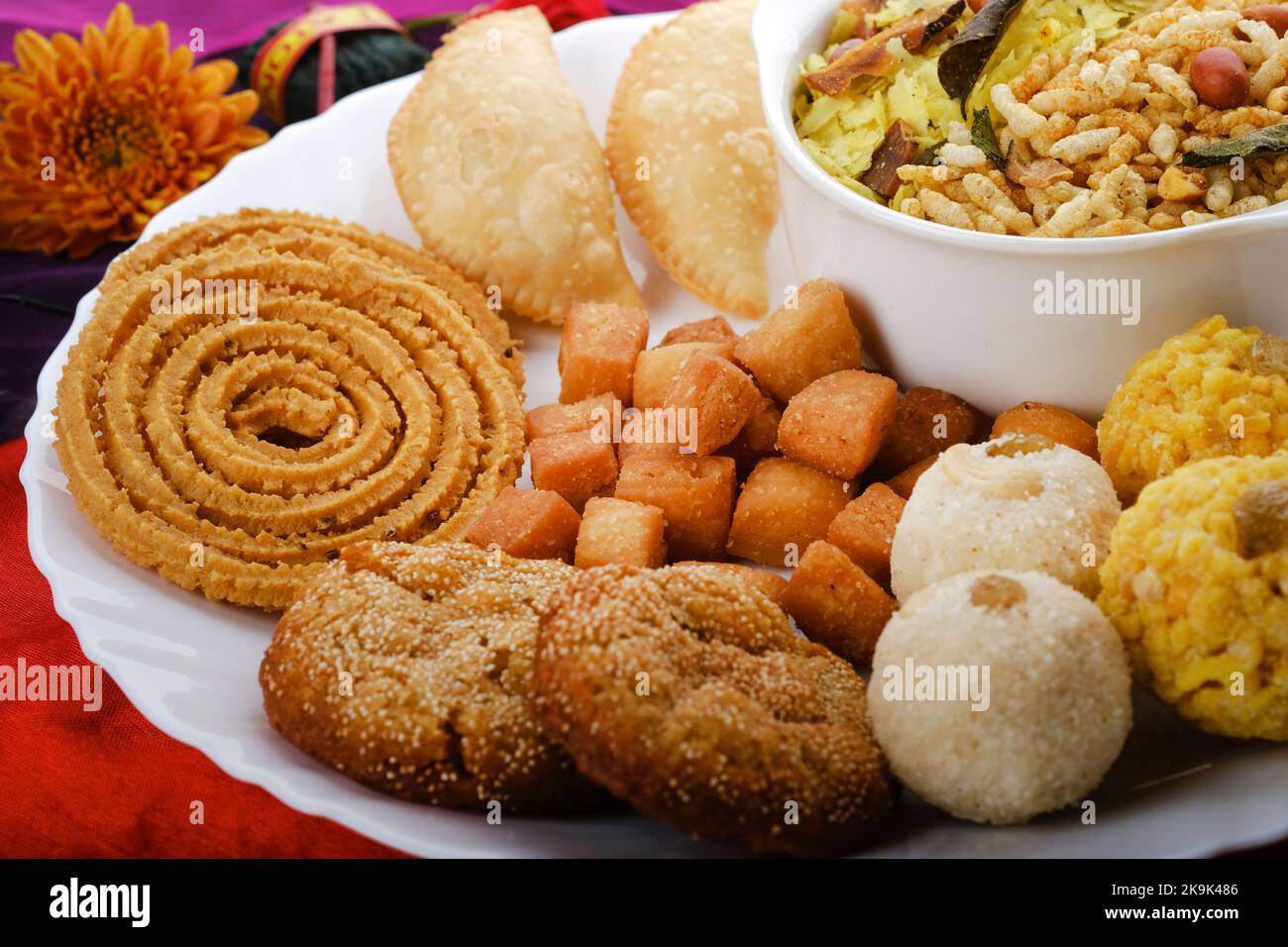 Diwali snacks Diwali faral, Diwali Special sweet and salty snacks, Festival snacks from Maharashtra, India. Stock Photo