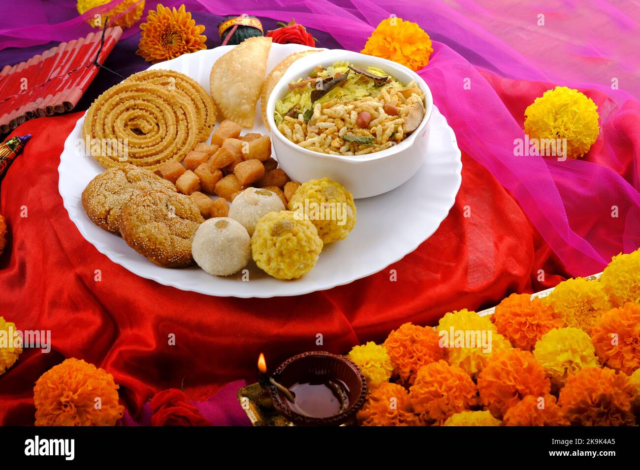 Diwali snacks Diwali faral, Diwali Special sweet and salty snacks, Festival snacks from Maharashtra, India. Stock Photo