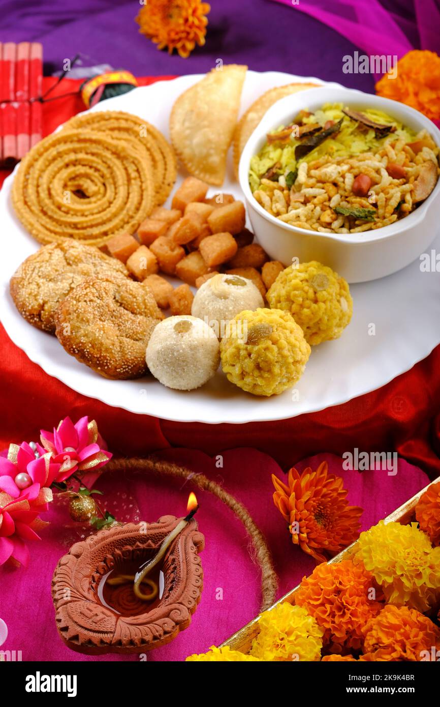 Diwali snacks Diwali faral, Diwali Special sweet and salty snacks, Festival snacks from Maharashtra, India. Stock Photo