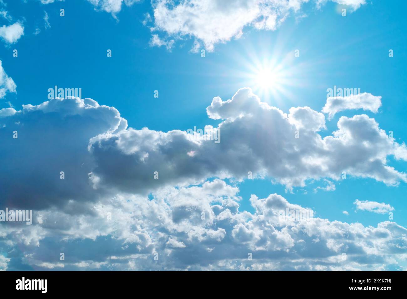 Beautiful cloudy blue sky sun hi-res stock photography and images - Alamy