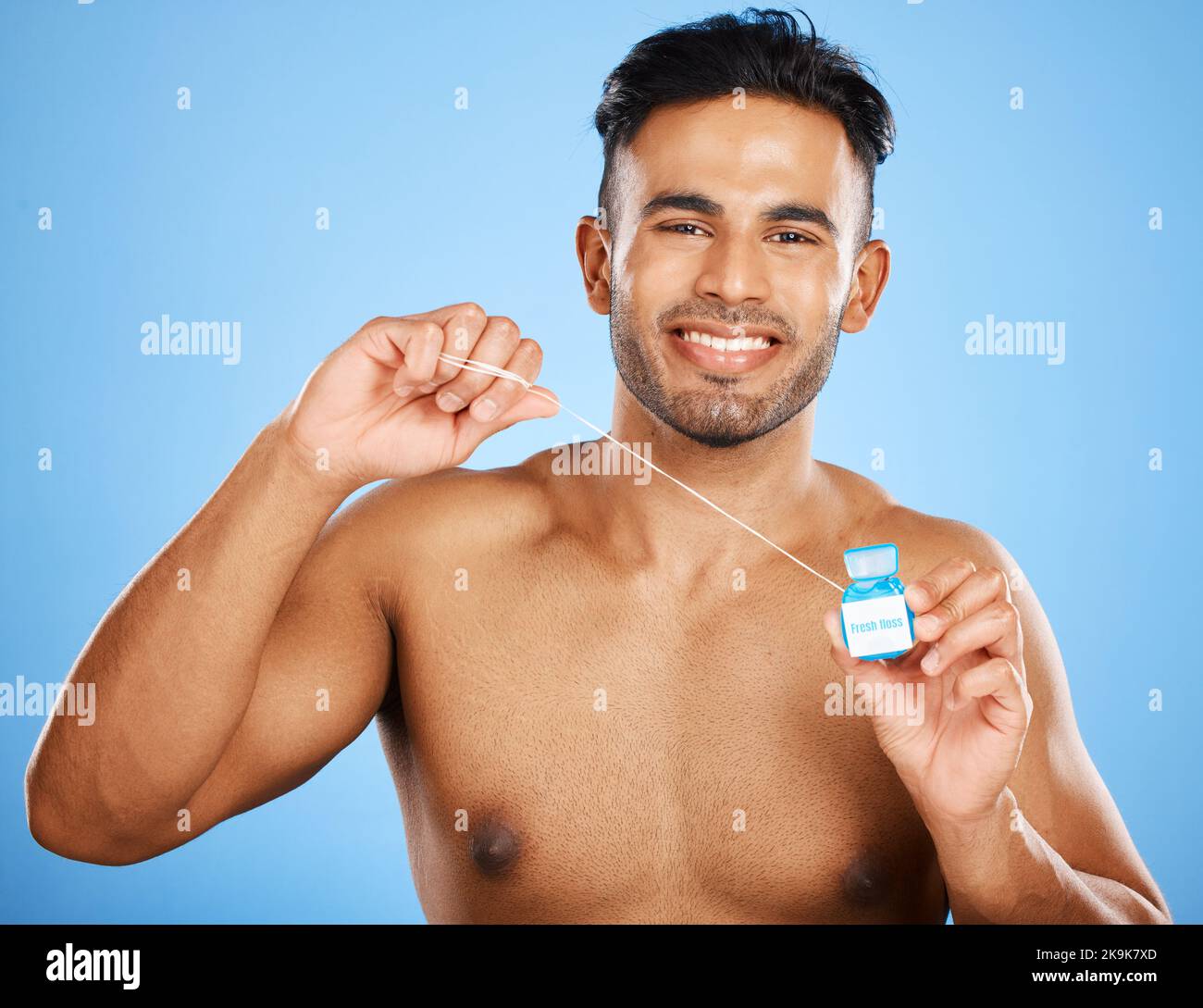 Man dental floss cleaning teeth hi-res stock photography and images - Alamy