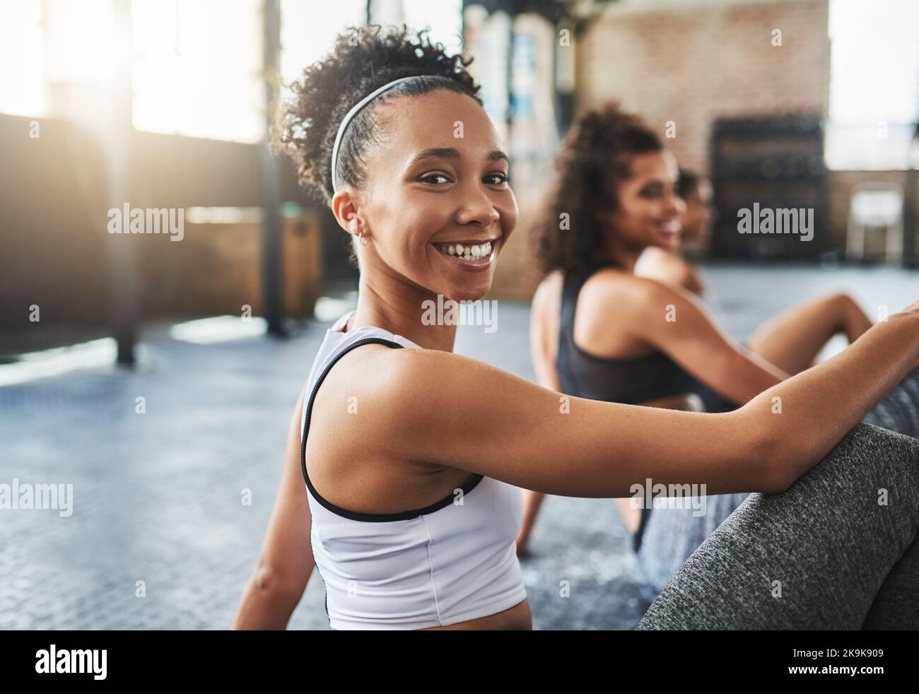 That smile when you know you slayed your workout. a group of happy young  women taking a break together at the gym Stock Photo - Alamy