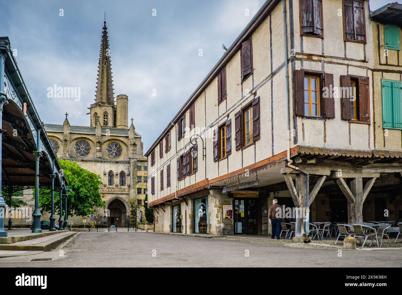 View on the half timbered medieval houses, the covered market hall and the Saint Maurice gothic cathedral in Mirepoix, in the south of France (Ariege) Stock Photo