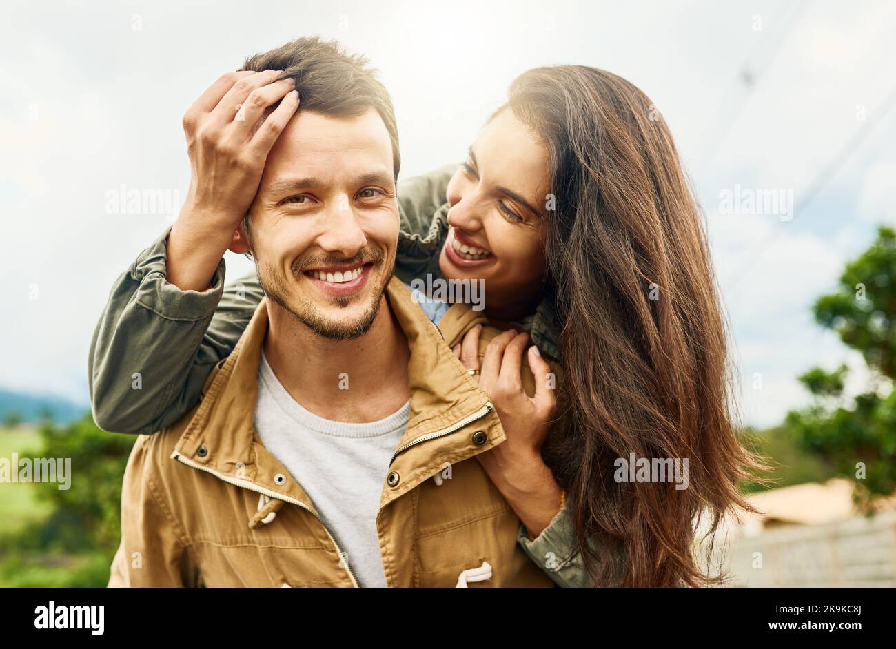 I love her more than words can describe. a playful couple spending the ...