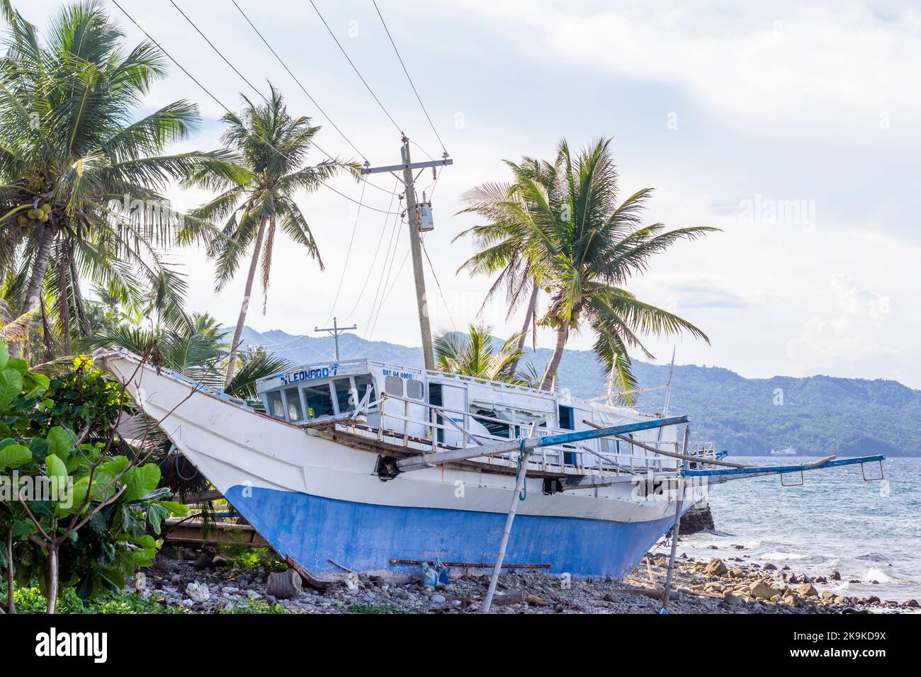 An outrigger boat at the beach in Batangas, Philippines Stock Photo