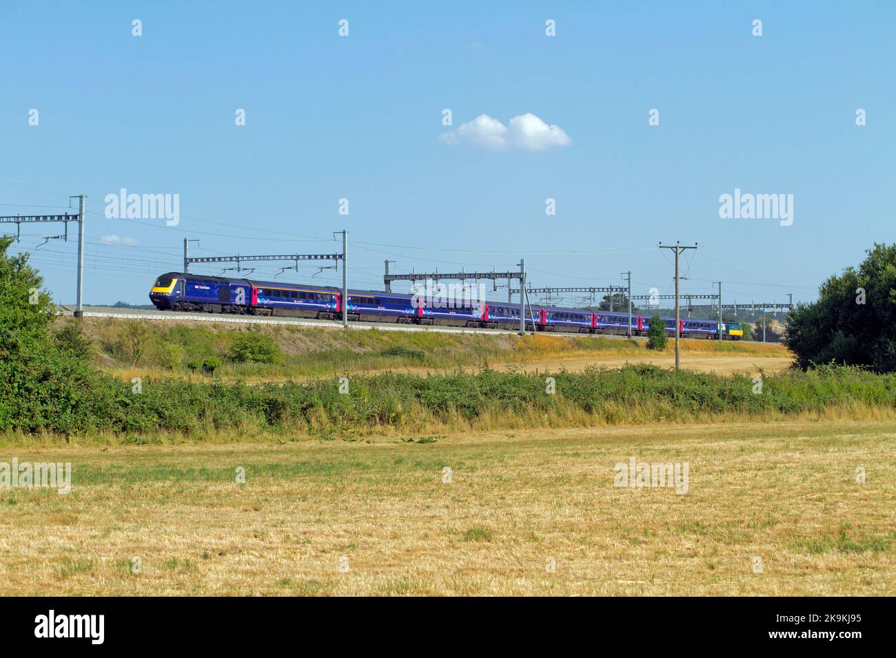 An HST with powers cars 43137 and 43002 working a Great Western Railway service at South Stoke on the 26th July 2018. Stock Photo