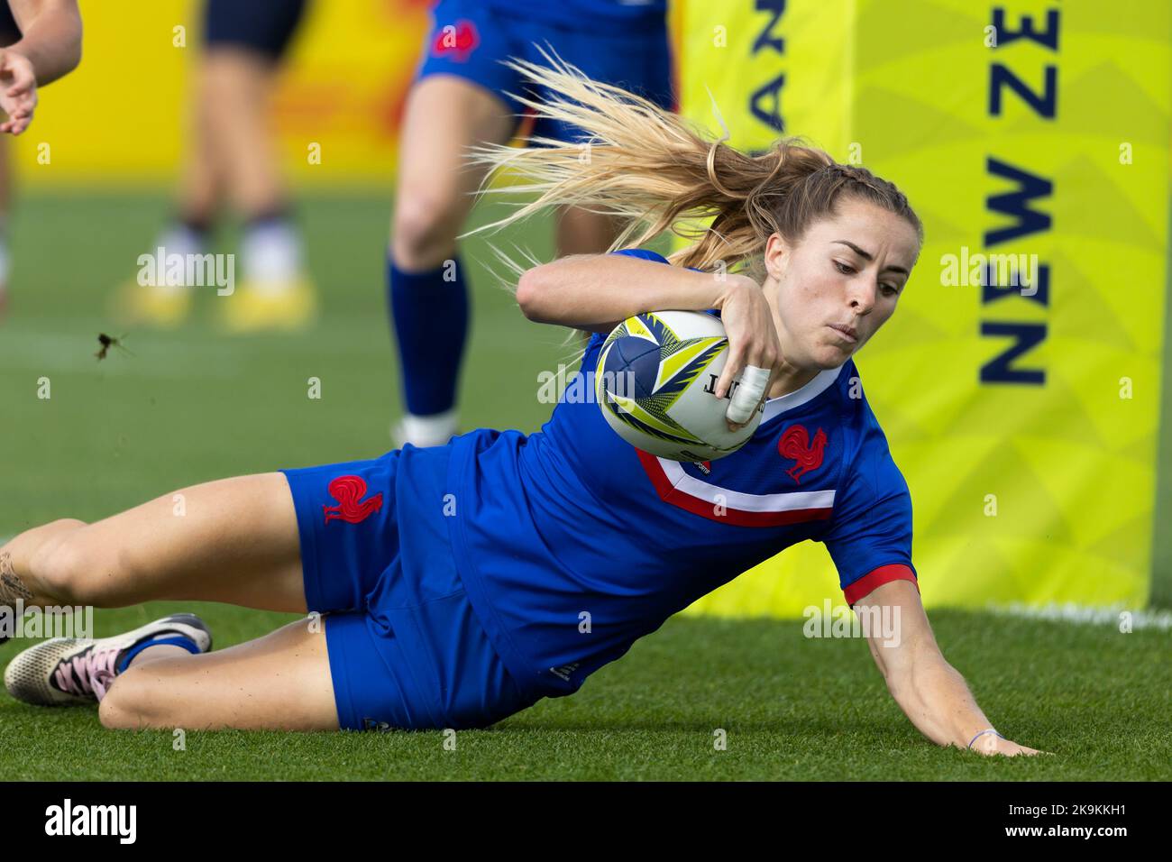 France's Joanna Grisez scores the opening try in the Women's Rugby