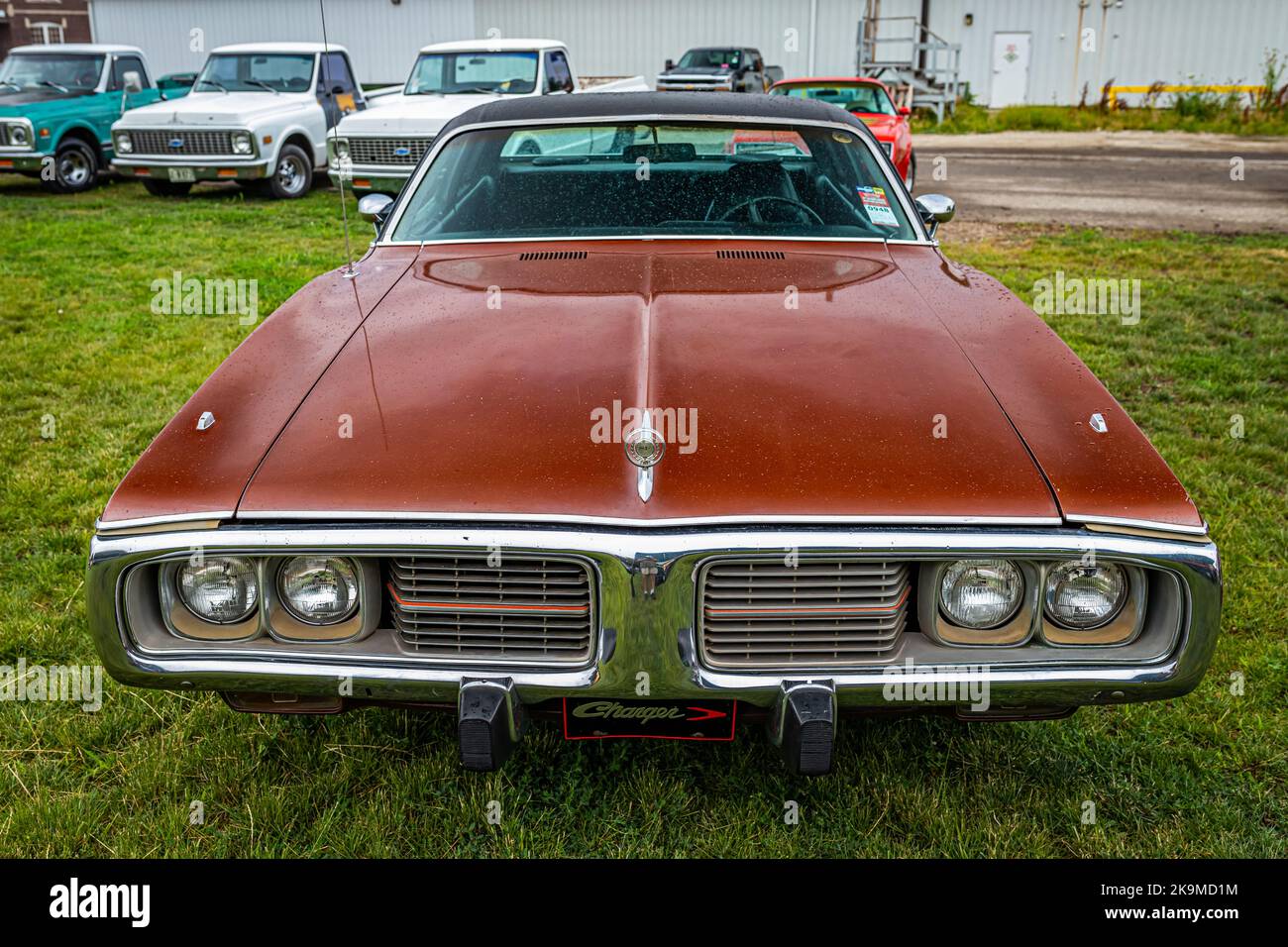 Des Moines, IA - July 01, 2022: High perspective front view of a 1973 Dodge Charger Hardtop Coupe at a local car show. Stock Photo
