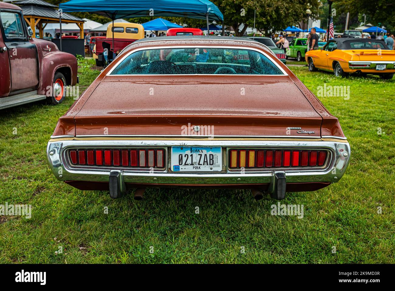 Des Moines, IA - July 01, 2022: High perspective rear view of a 1973 Dodge Charger Hardtop Coupe at a local car show. Stock Photo