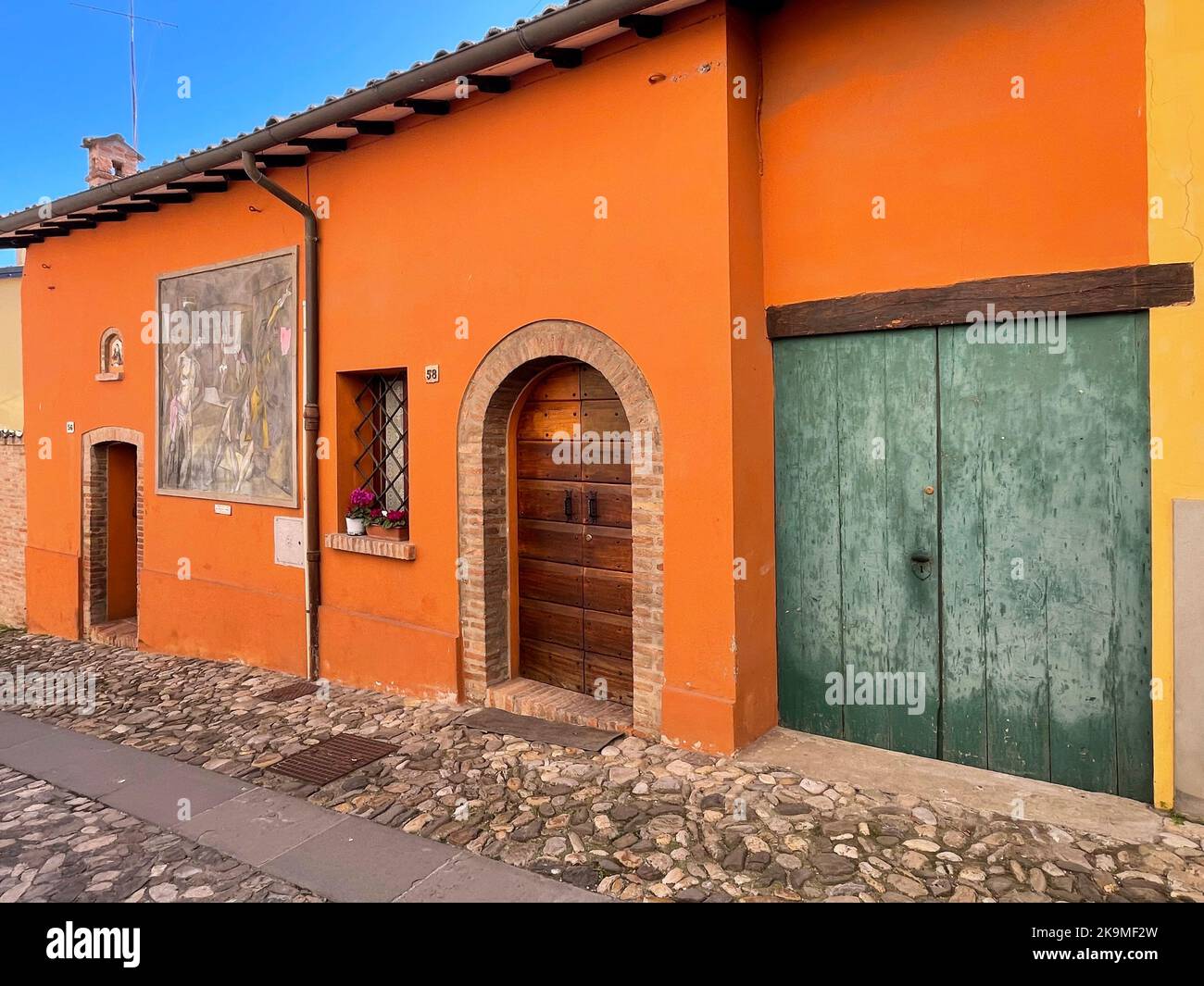Dozza, Italy. Murals on the facade of historical buildings, created by artists during the "Nuova