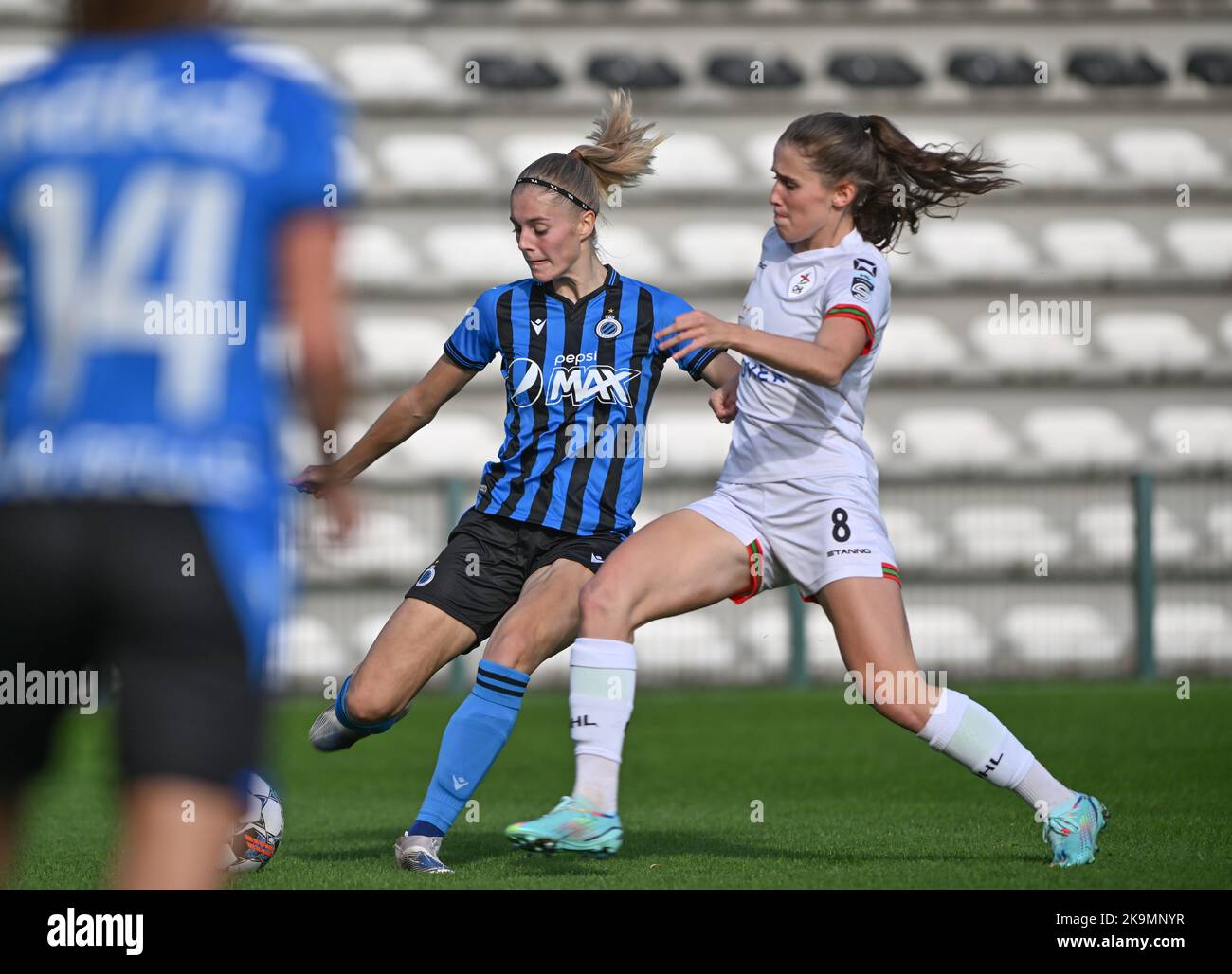Marith Decabooter (12) of Brugge and Marie Detruyer (8) of OHL pictured