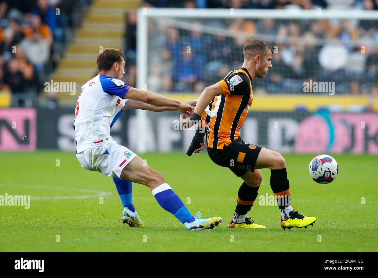 Dimitrios Pelkas #20 of Hull City and Harry Pickering #3 of Blackburn Rovers during the Sky Bet Championship match Hull City vs Blackburn Rovers at MKM Stadium, Hull, United Kingdom, 29th October 2022  (Photo by Ben Early/News Images) Stock Photo