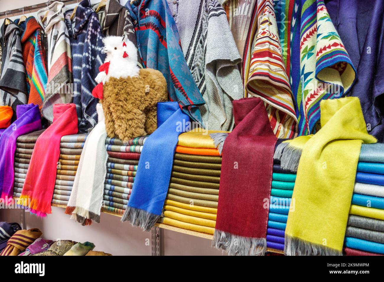 Bogota Colombia,Usaquen Carrera 6a Mercado de Las Pulgas en Usaquen Sunday Flea Market,arts crafts display sale llama wool scarf scarves,vendor vendor Stock Photo