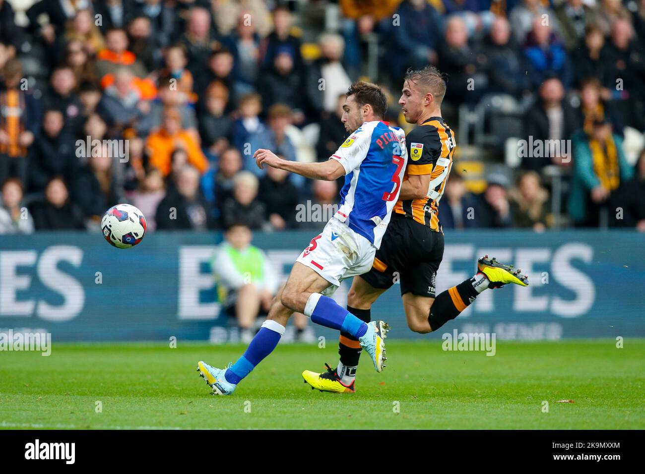 Dimitrios Pelkas #20 of Hull City and Harry Pickering #3 of Blackburn Rovers during the Sky Bet Championship match Hull City vs Blackburn Rovers at MKM Stadium, Hull, United Kingdom, 29th October 2022  (Photo by Ben Early/News Images) Stock Photo