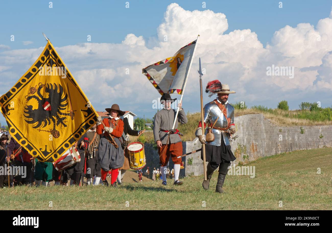 PALMANOVA, Italy - September 4, 2022: Reenactors parading after the battle during the Seventeenth Century annual historical reenactment Stock Photo