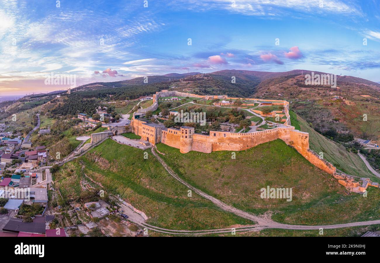 Aerial panoramic view of the ancient citadel Naryn-Kala, fortress wall. Photography from above early in the morning on a sunny summer day. Derbent old Stock Photo