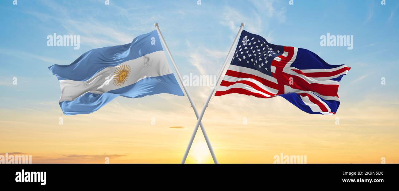 Crossed National Flags Of Argentine And United Kingdom And United   Crossed National Flags Of Argentine And United Kingdom And United States Of America Flag Waving In Wind At Cloudy Sky Symbolizing Relationship Di 2K9N5D6 