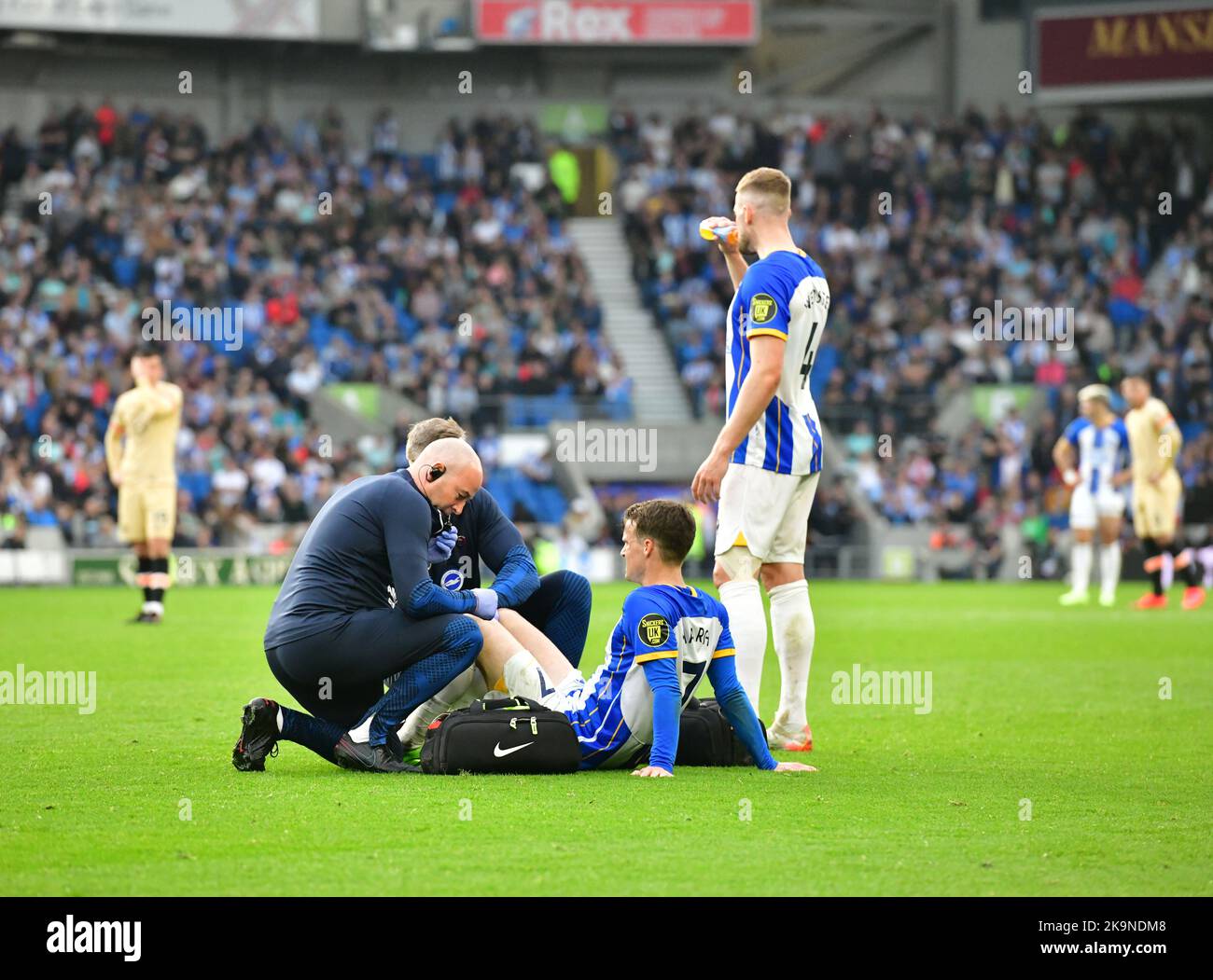 Brighton, UK. 29th Oct, 2022. Solly March of Brighton and Hove Albion receives treatment during the Premier League match between Brighton & Hove Albion and Chelsea at The Amex on October 29th 2022 in Brighton, England. (Photo by Jeff Mood/phcimages.com) Credit: PHC Images/Alamy Live News Stock Photo