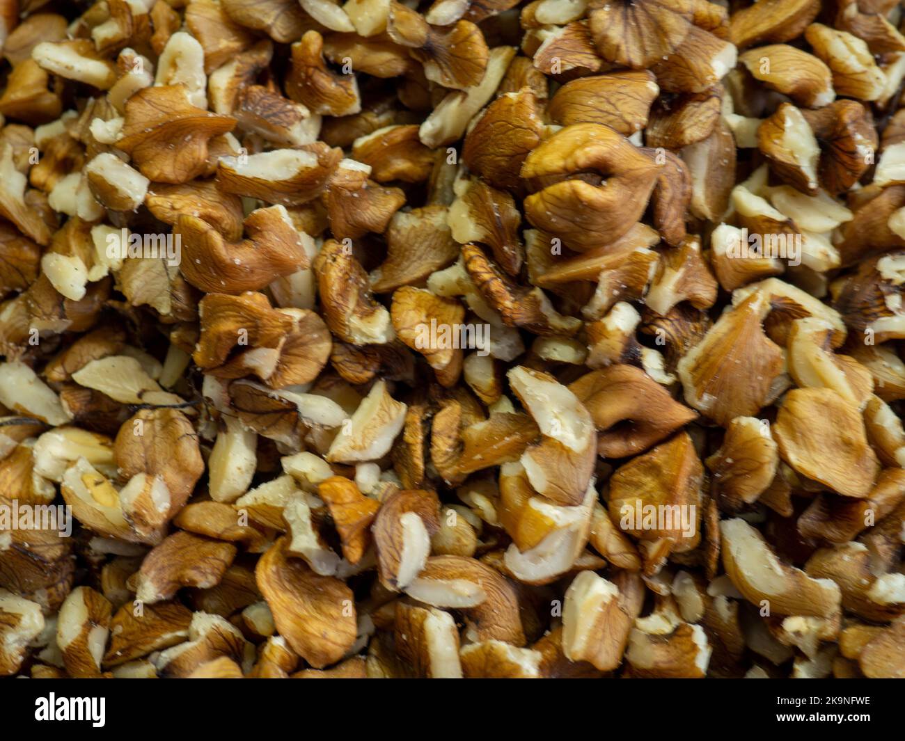 Peeled nuts. Background of nuts without shells. Snack on the