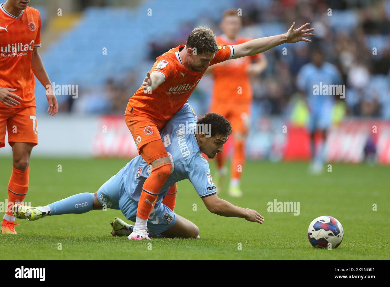 Coventry City's Tyler Walker and Blackpool's James Husband battle for the ball during the Sky Bet Championship match at the Coventry Building Society Arena, Coventry. Picture date: Saturday October 29, 2022. Stock Photo