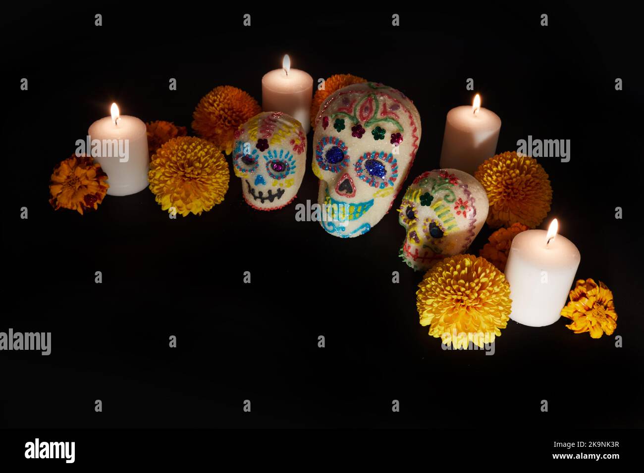 Dia de los muertos - Day of the dead Sugar skull with candles, and ...