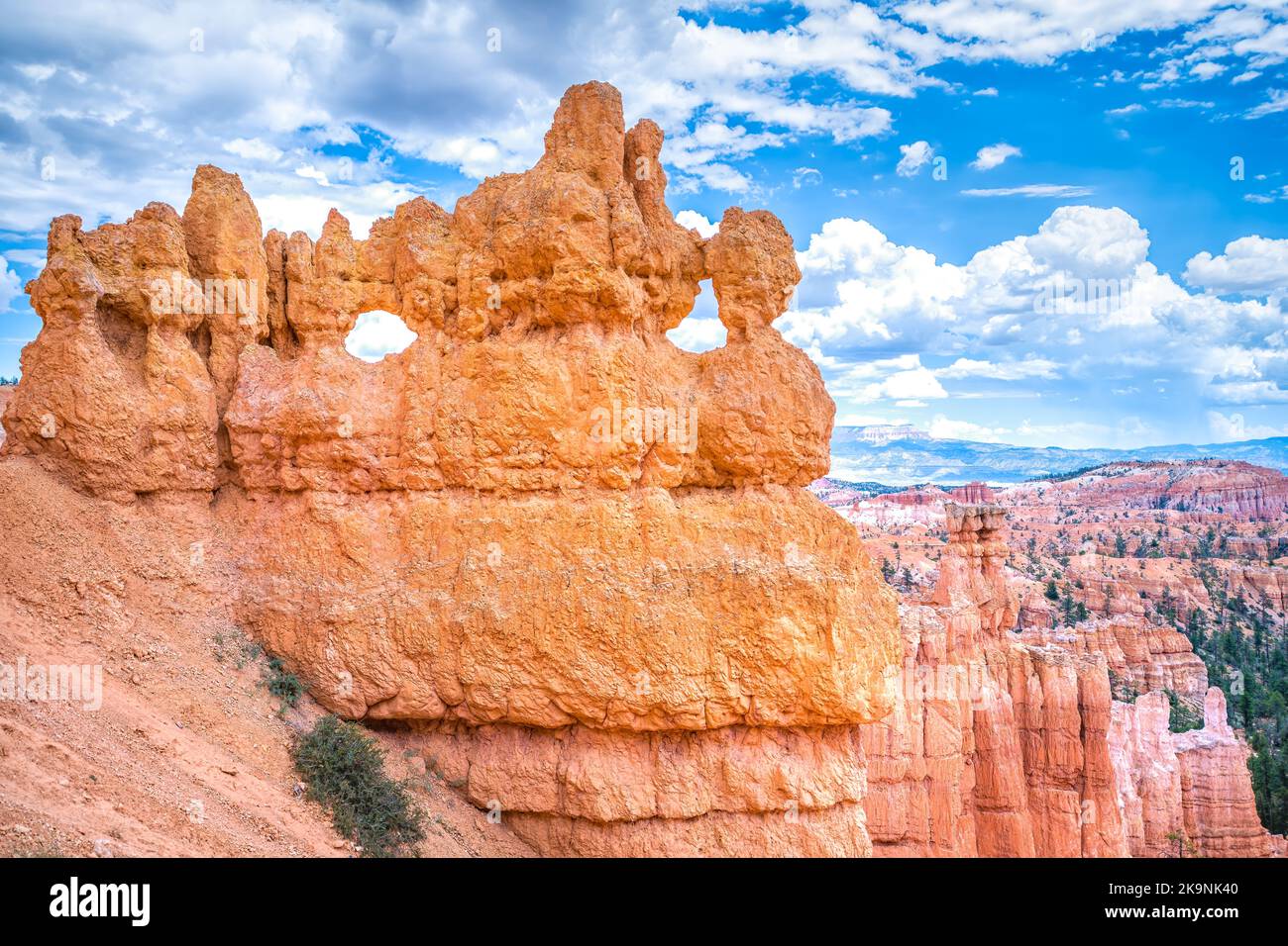 High angle above aerial view of orange sandstone hoodoos rock formations at Bryce Canyon National Park, Utah of Queens Garden Navajo Loop trail Stock Photo