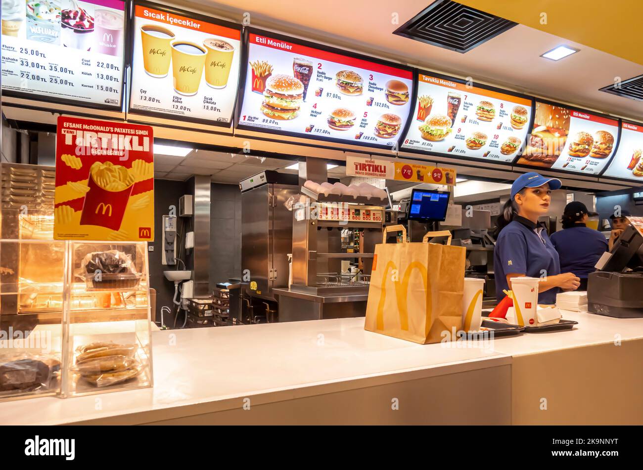 McDonalds Antalya interior. McDo menu,uniformed staff working/ Mcdonalds restaurant Turkey Stock