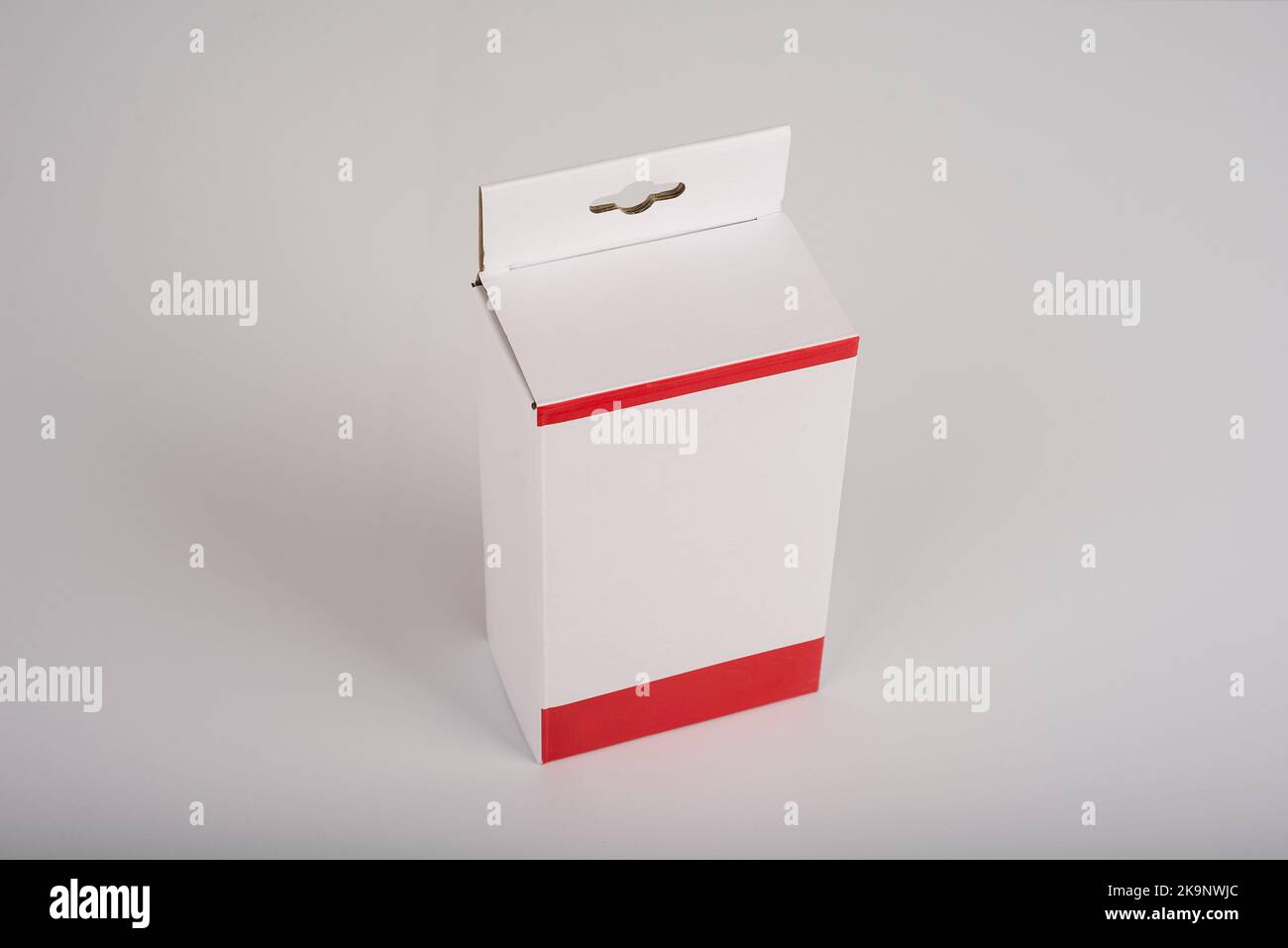 White Paper Packaging Box With a Hanging Hole Stock Photo