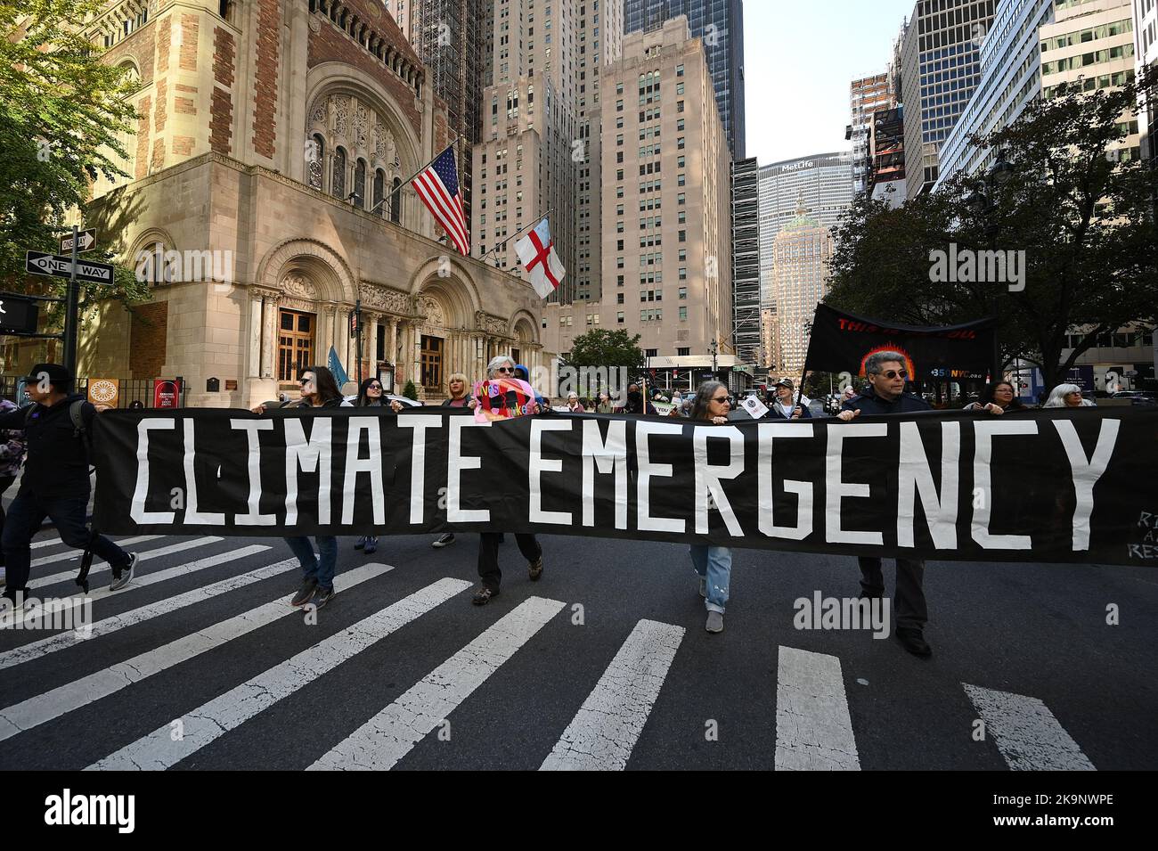 Climate activists march down Park Avenue on the 10th Anniversary of