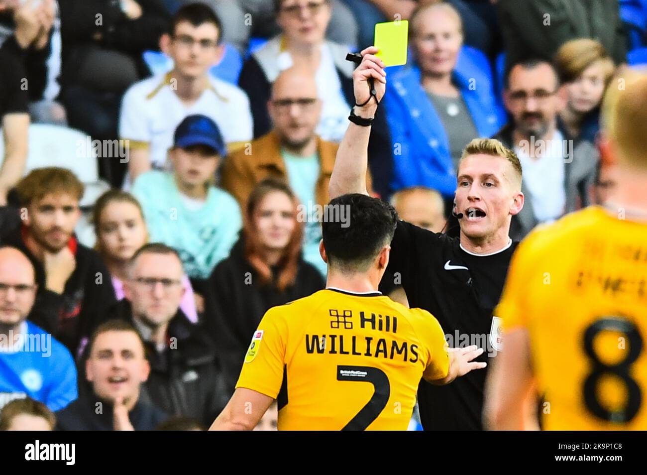 George Williams (2 Cambridge United) receives a yellow card during the Sky Bet League 1 match between Peterborough and Cambridge United at London Road, Peterborough on Saturday 29th October 2022. (Credit: Kevin Hodgson | MI News) Credit: MI News & Sport /Alamy Live News Stock Photo