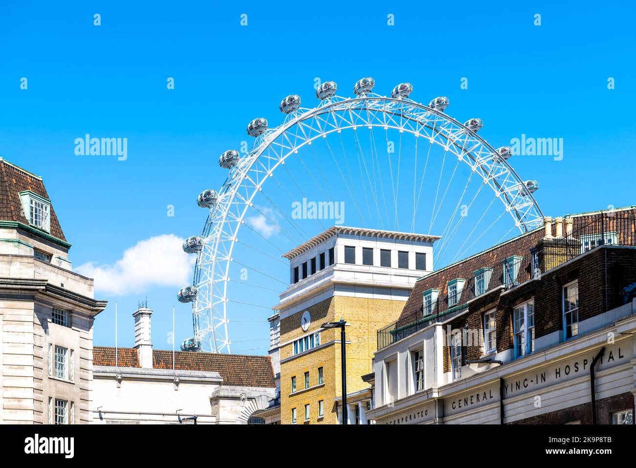 London, United Kingdom - June 22, 2018: Lambeth General Lying-In Hospital premier inn hotel with London Eye Millennium ferris wheel buildings Stock Photo