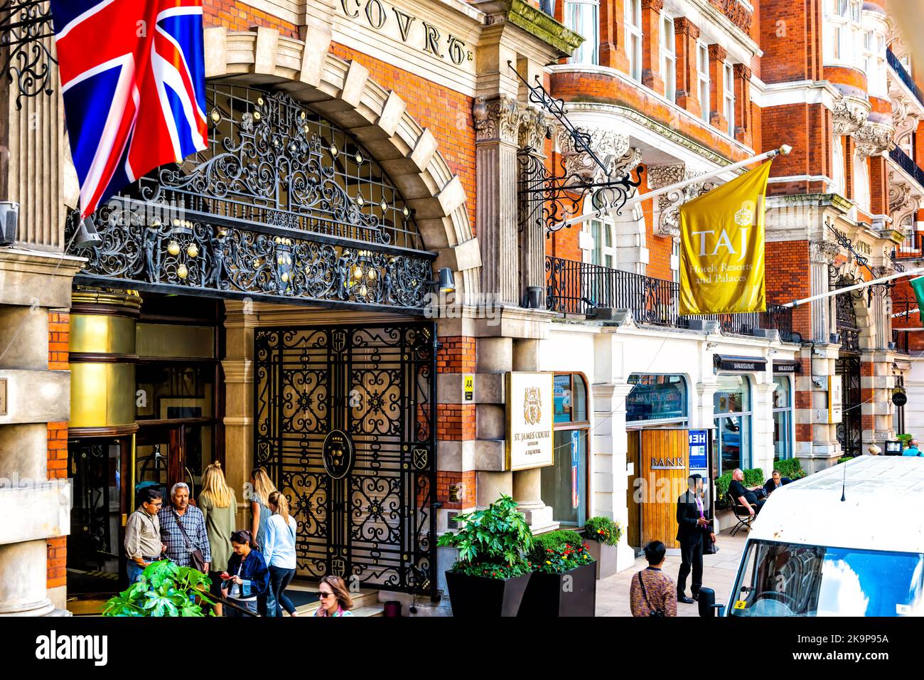 London, United Kingdom - June 22, 2018: St. James' Court Taj hotel resort entrance sign with Indian people tourists in city of Westminster Stock Photo