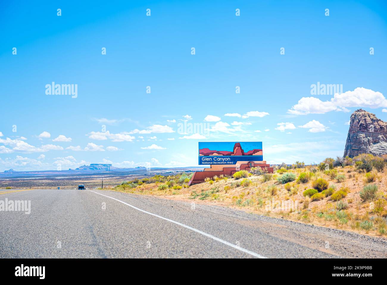 Kanab, USA - August 8, 2019: Road sign for Utah Glen Canyon Recreation area, National park service by desert summer landscape by interstate highway 89 Stock Photo