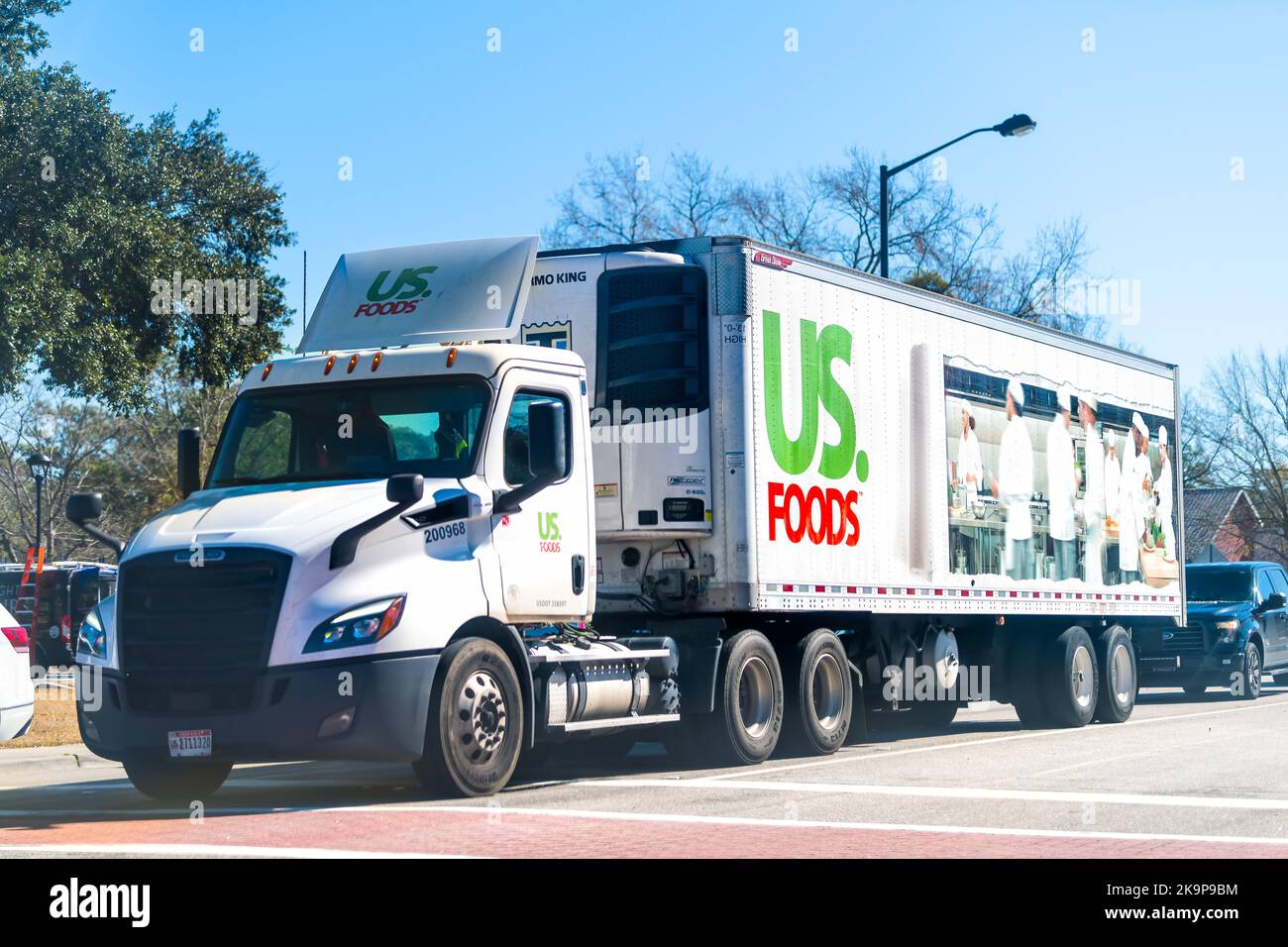 Jamestown, USA - February 3, 2021: US Foods food delivery distribution truck car vehicle with trailer transporting products in South Carolina Stock Photo