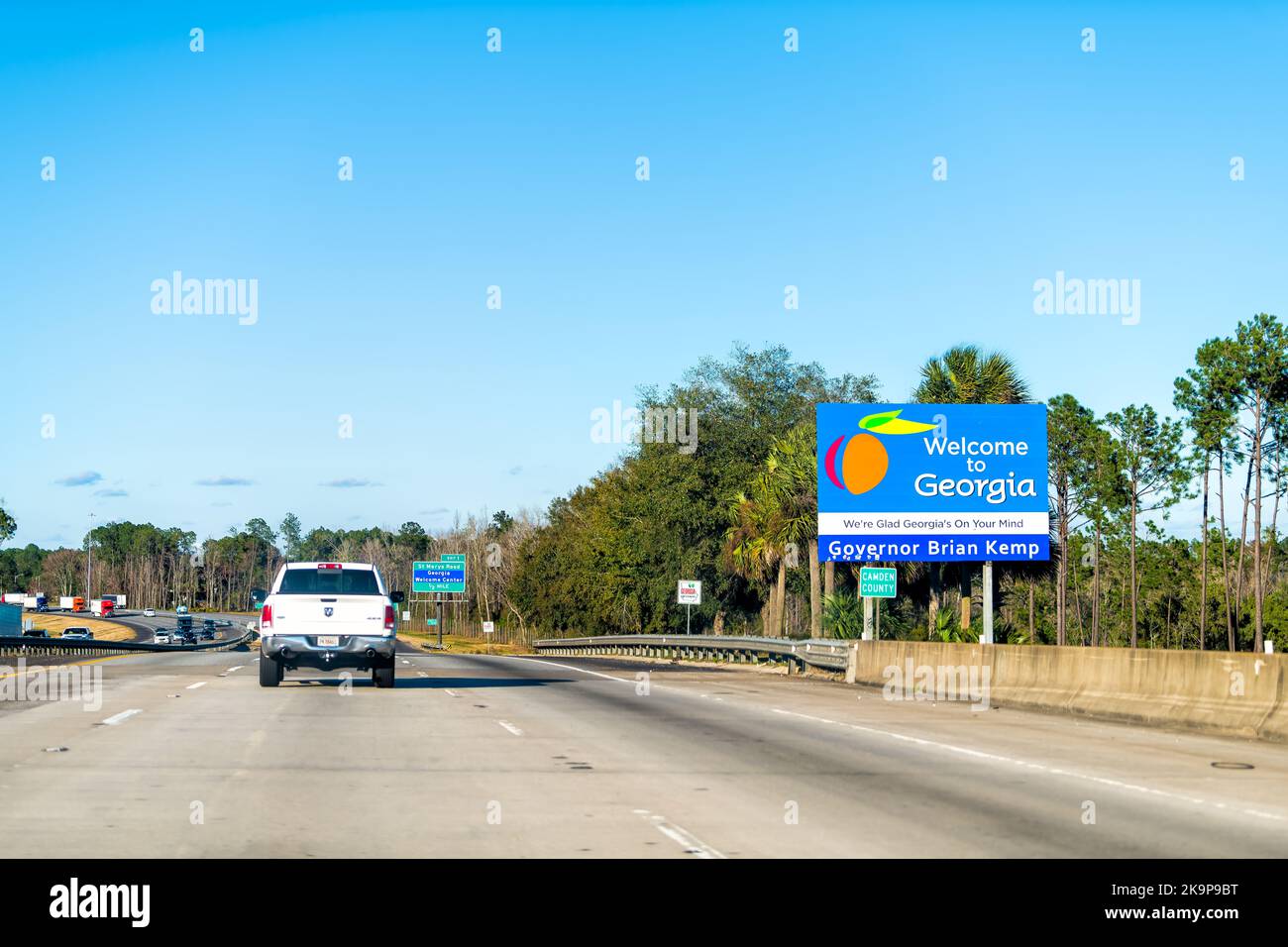 Kingsland, USA - February 2, 2021: Welcome to Georgia state border line sign by Governor Brian Kemp on interstate highway road 95 in Camden county Stock Photo