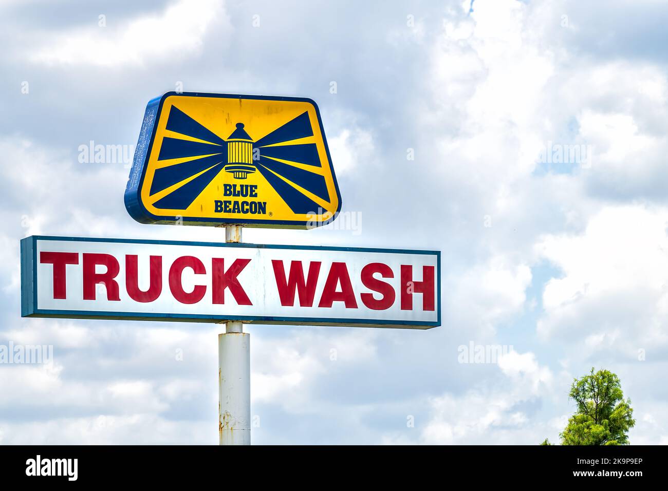 Fort Pierce, USA - July 8, 2021: Florida North Kings interstate highway road 95 with Blue Beacon truck wash stop rest area sign signpost pole Stock Photo
