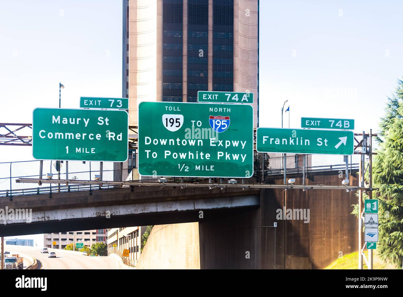 Richmond, USA - October 18, 2021: Sign on i95 interstate highway in Virginia for green road exit signs to downtown Virginia capital city Stock Photo