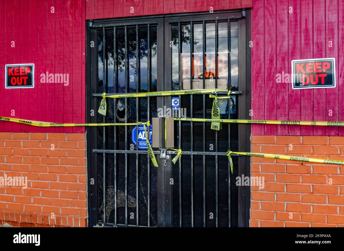 An abandoned strip mall is pictured, Oct. 24, 2022, in Bayou La Batre, Alabama. The abandoned