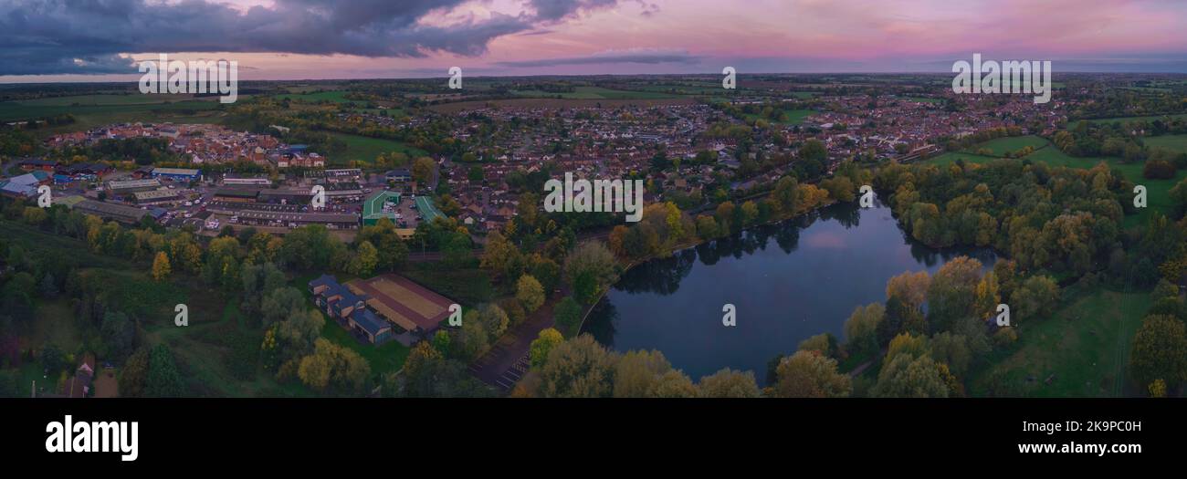 An aerial view of the lake at sunrise in Needham Market, Suffolk UK