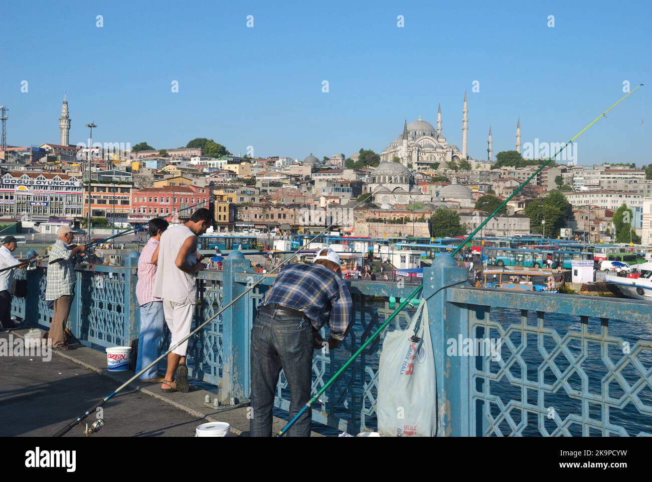 Fishermen on the Galata Bridge in Istanbul, Turkey Stock Photo