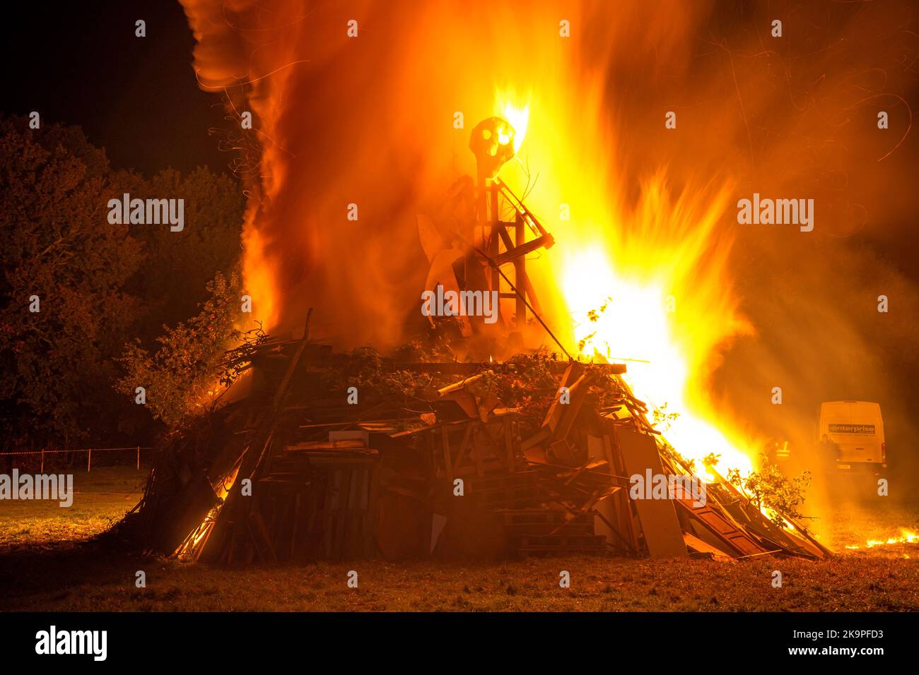 Rusthall, Tunbridge Wells, Kent, UK. 29 October 2022. A bonfire with firework display is lit on the village green of Rusthall where crowds gather for this free event. An effigy of the grim reaper is set on a large bonfire, to mark halloween and the start of bonfire season. ©Sarah Mott / Alamy Live News. Stock Photo
