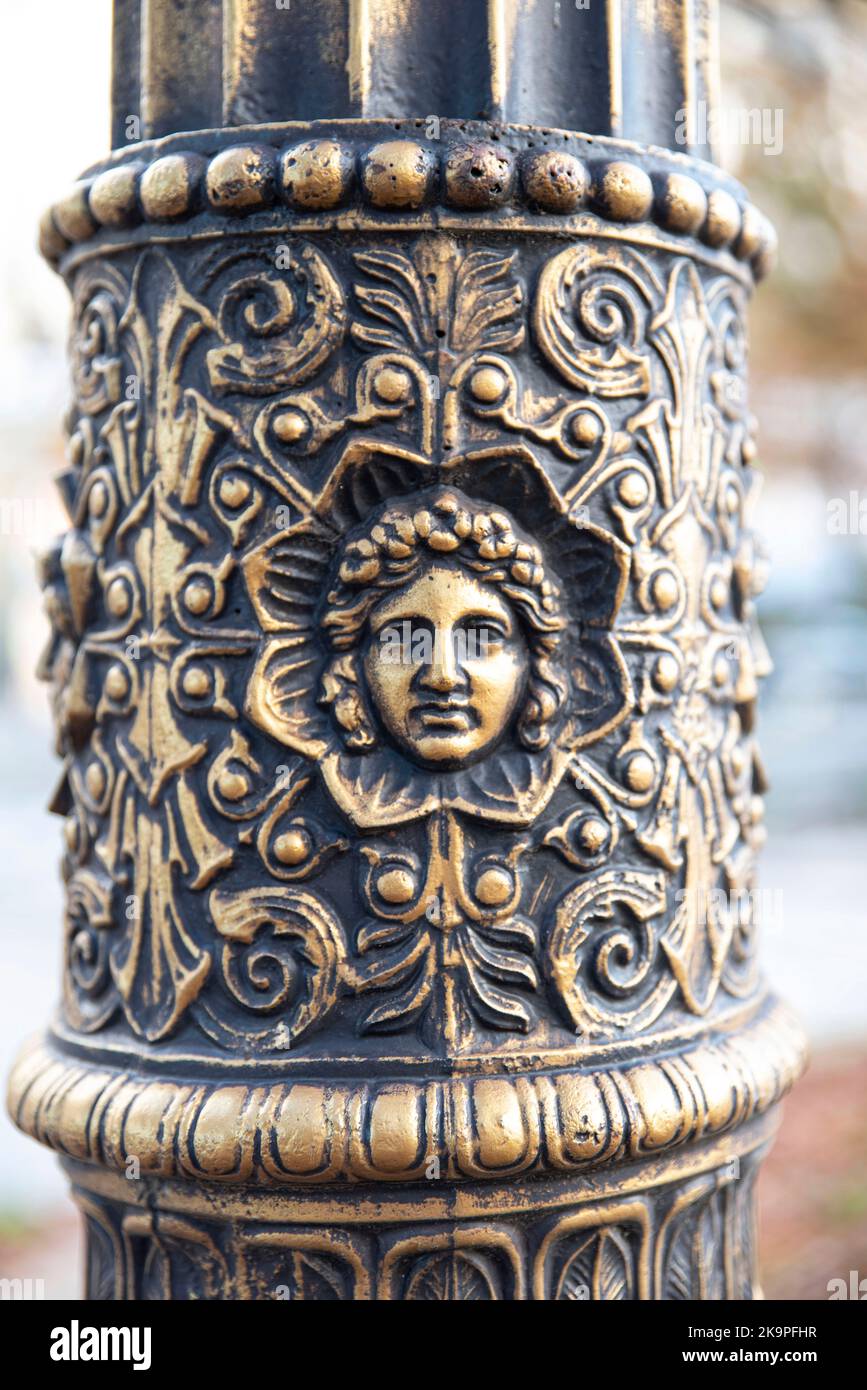 Detail of a street lamp post sculpture in the streets of Paris, France