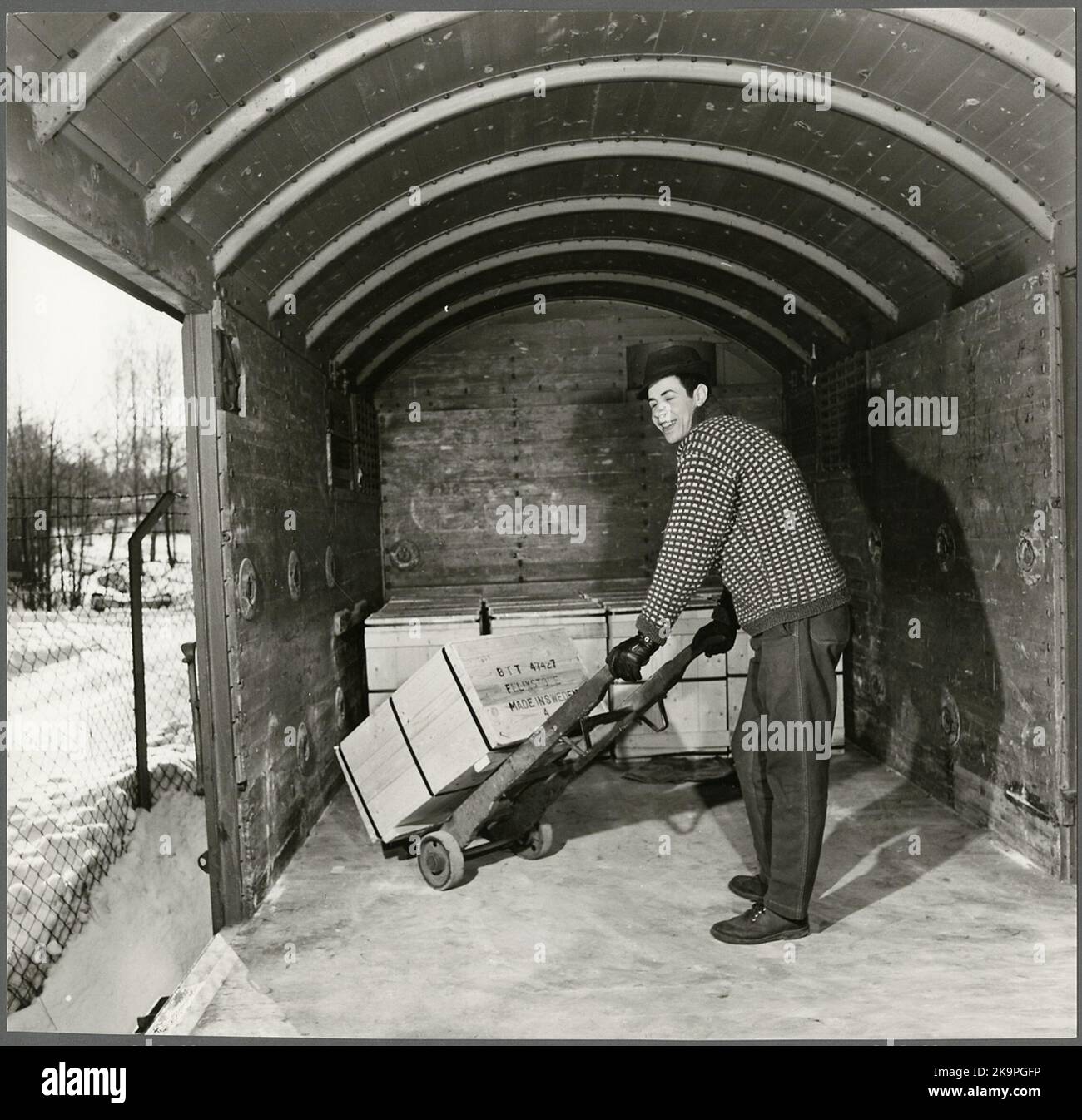 Loading of freight wagon at AB Iron Processing Stock Photo - Alamy