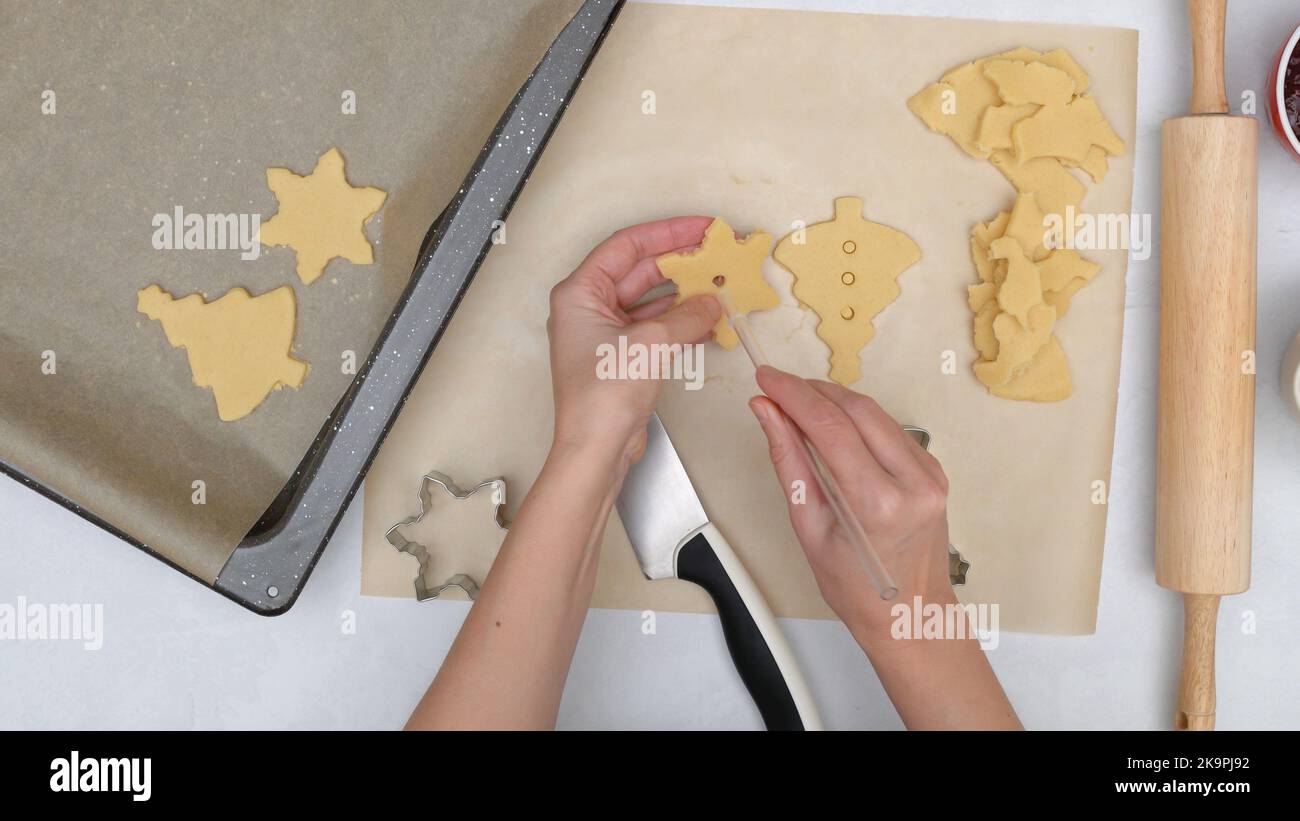 Christmas shortbread cookies with raspberry jam recipe, close up baking process, flat lay. Chef