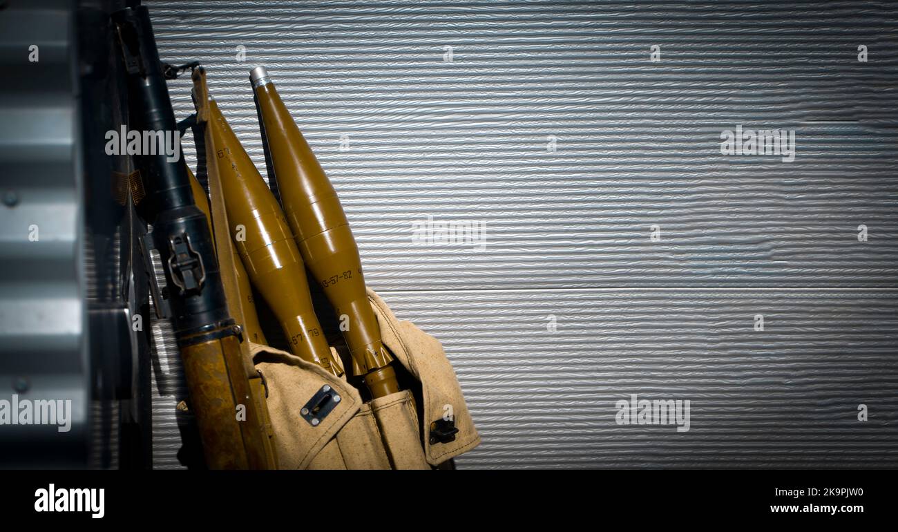 Gun and artillery shells, militant equipment closeup. Stock Photo