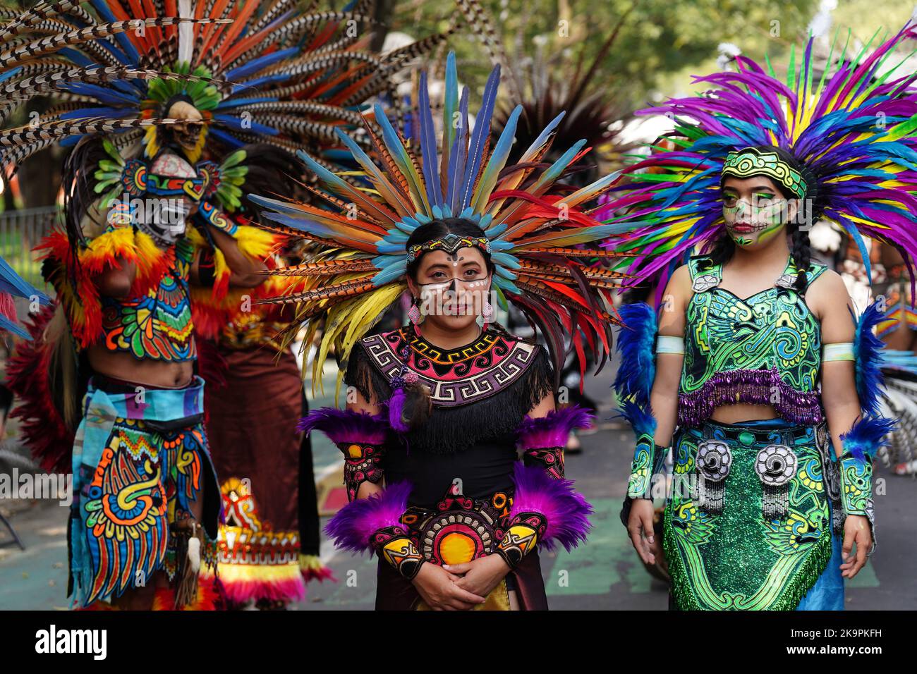 Mexico City, Mexico. 29th Oct, 2022. Indigenous dancers line up before marching in the Grand Parade of the Dead to celebrate Dia de los Muertos holiday on Paseo de la Reforma, October 29, 2022 in Mexico City, Mexico. Credit: Richard Ellis/Richard Ellis/Alamy Live News Stock Photo