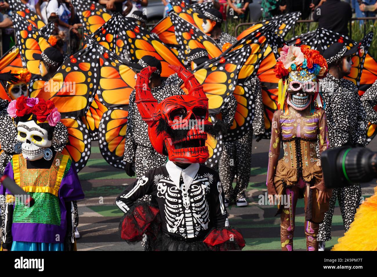 Mexico City, Mexico. 29th Oct, 2022. Skeletons and monarch butterfly costumed performers during the Grand Parade of the Dead to celebrate Dia de los Muertos holiday on Paseo de la Reforma, October 29, 2022 in Mexico City, Mexico. Credit: Richard Ellis/Richard Ellis/Alamy Live News Stock Photo
