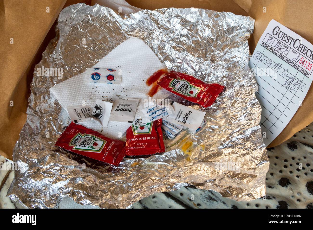 Still life of food delivery and receipt, USA 2022 Stock Photo