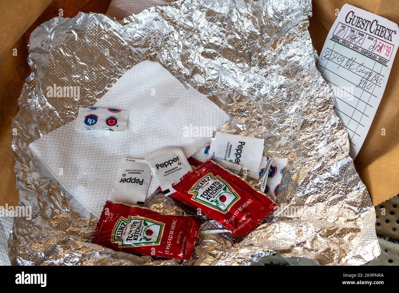 Still life of food delivery and receipt, USA 2022 Stock Photo